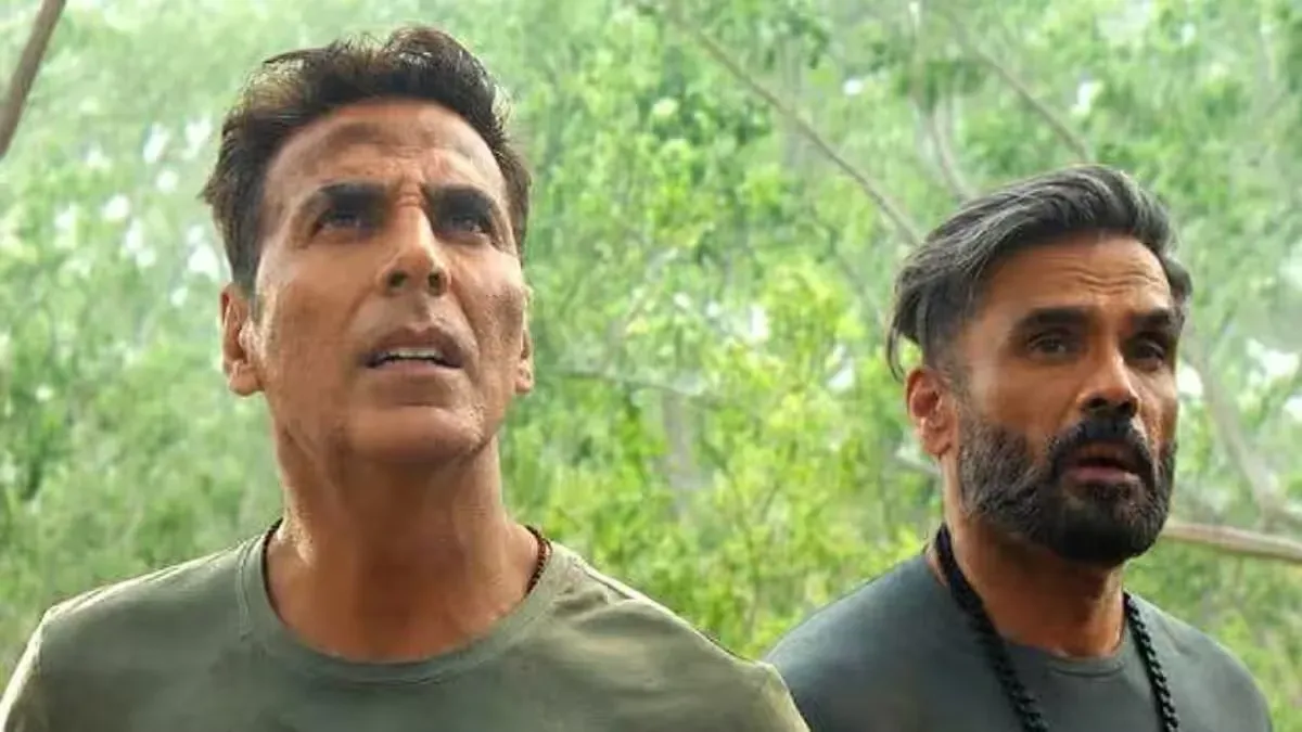Akshay Kumar smiling in a vibrant jungle setting from the Welcome To The Jungle movie poster.