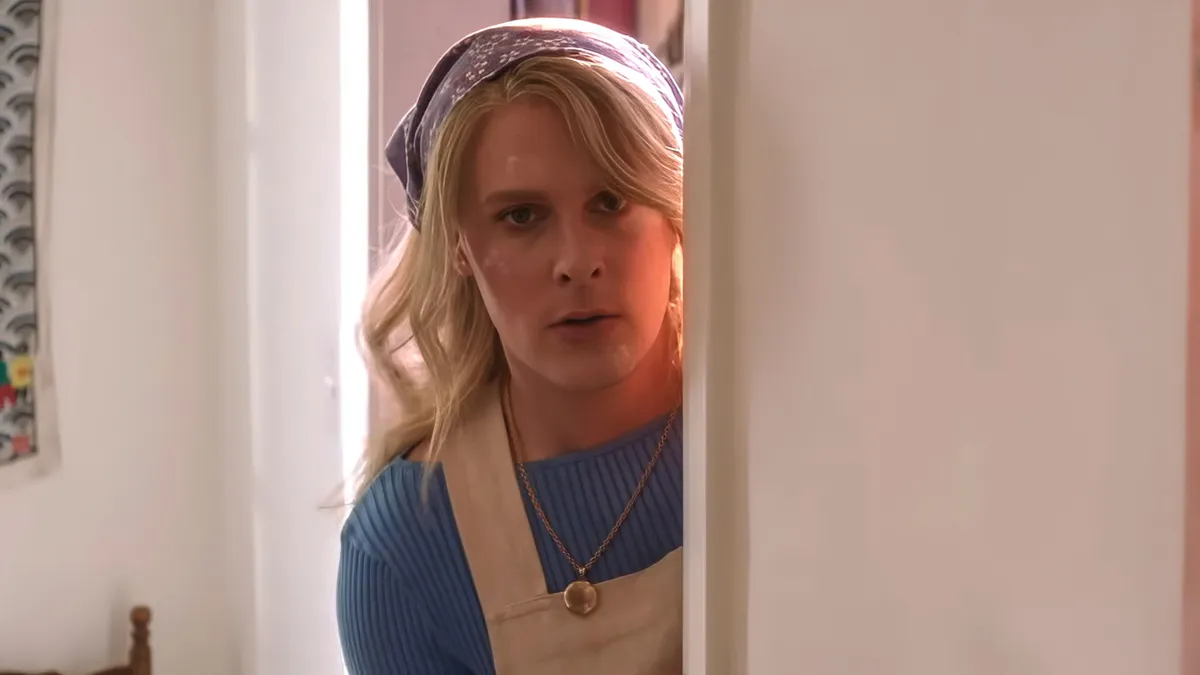 John Early wearing a wig and costume for his movie Maddie's Secret.