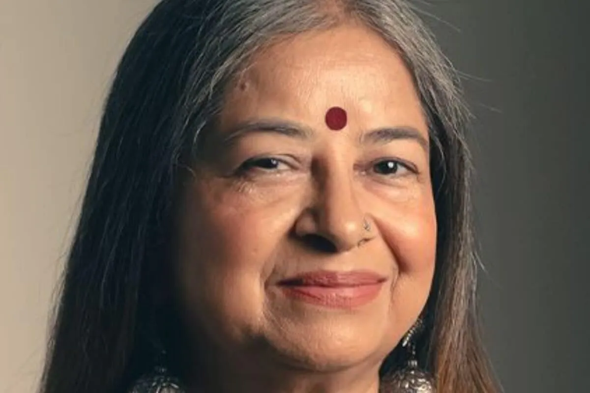 Close-up photo of Rekha Bhardwaj, singer, smiling softly.