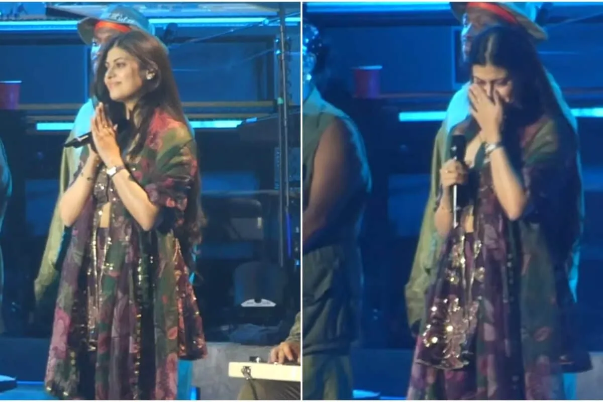 Zanai Bhosle on stage with Gorillaz, looking emotional during her performance.