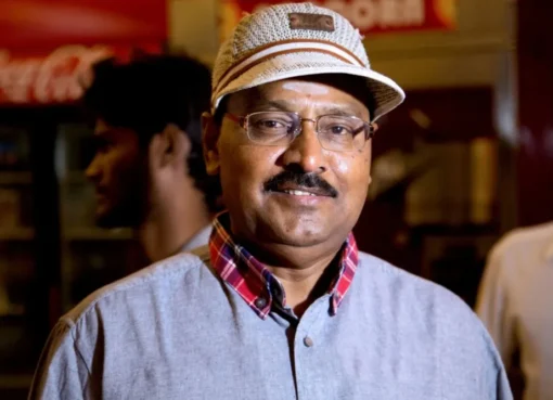 A smiling portrait of K. Bhagyaraj.