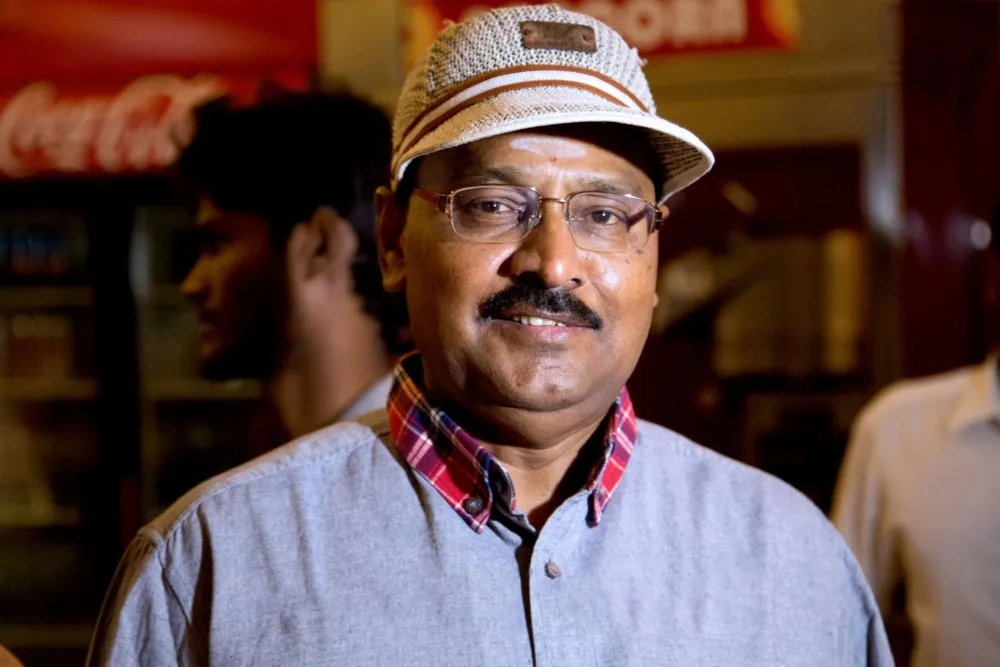 A smiling portrait of K. Bhagyaraj.
