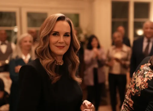 Elizabeth Perkins smiling on set