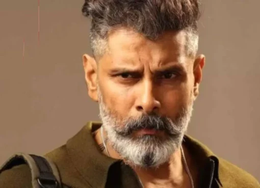 Chiyaan Vikram looking intense, possibly from an action film still, with a strong visual presence.