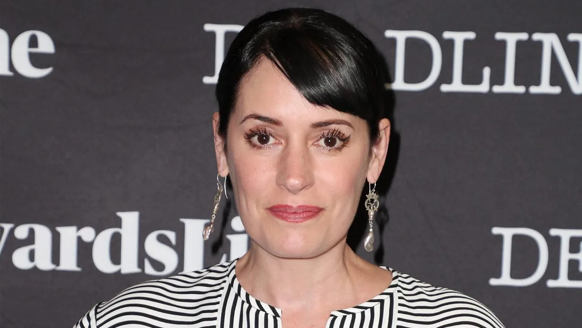 Paget Brewster looking serious and reflective, possibly thinking about her recent social media post.