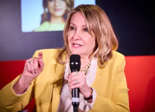 Dea Lawrence on stage speaking at Variety's Power of Women event in London.
