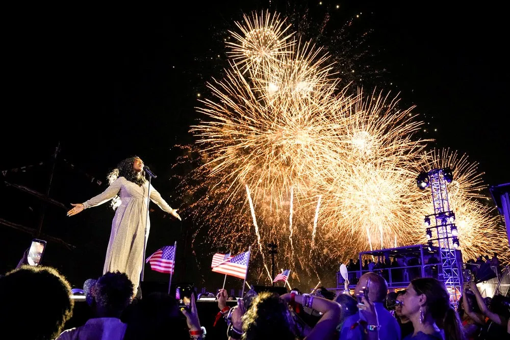 Bright colorful fireworks exploding over the New York City skyline at night