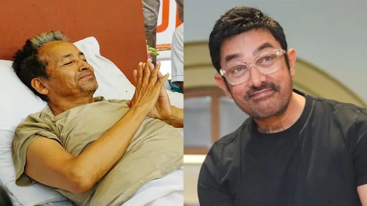 Aamir Khan smiling and waving