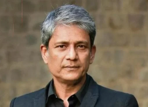 Adil Hussain, a distinguished Indian actor, looking thoughtful.