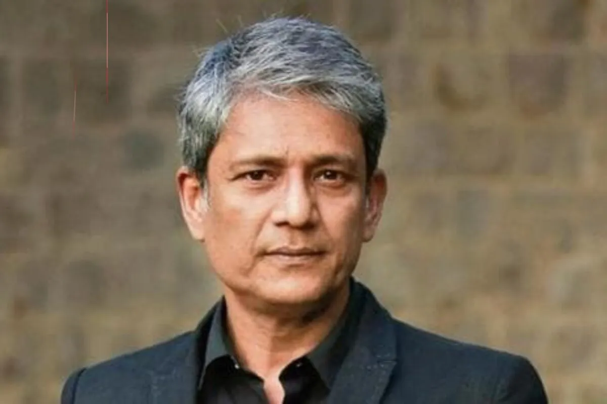 Adil Hussain, a distinguished Indian actor, looking thoughtful.