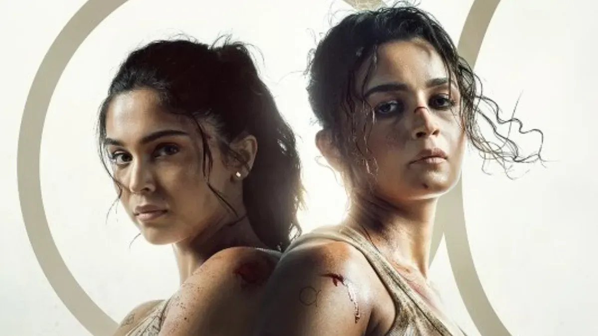 Alia Bhatt smiling in a promotional image for the movie 'Alpha'.