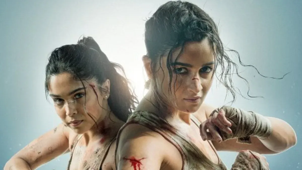 Alia Bhatt and Bobby Deol in a promotional still from the film Alpha, looking intense.