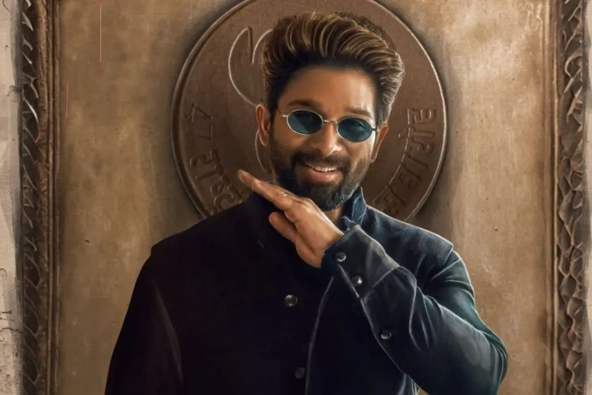 Allu Arjun smiling and giving a thumbs up.