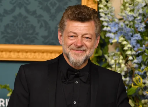 Andy Serkis smiling and gesturing while talking about his new Lord of the Rings film.