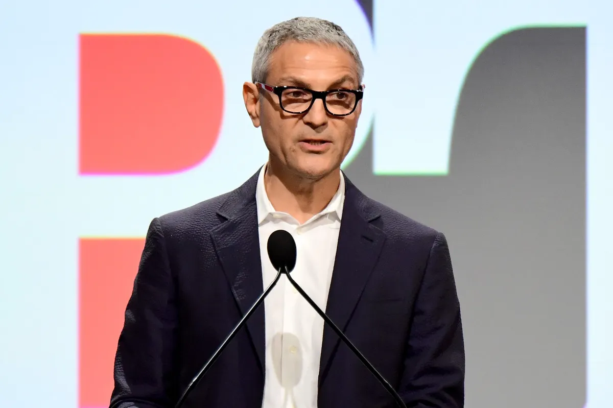 Ari Emanuel, a man in a suit, speaking intensely.