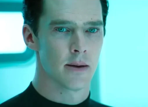 Benedict Cumberbatch with a serious expression, possibly at a press event or delivering an important message.