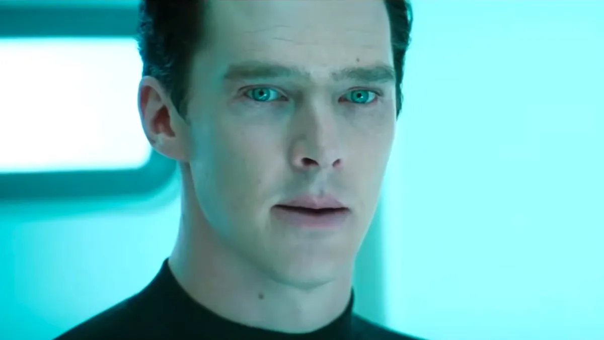 Benedict Cumberbatch with a serious expression, possibly at a press event or delivering an important message.