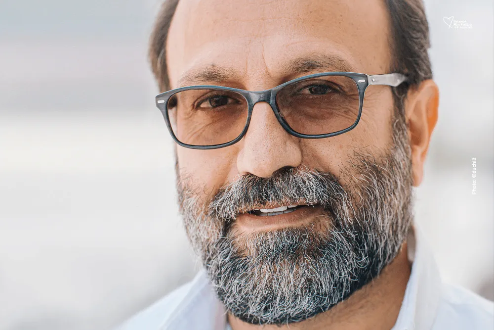 A portrait of filmmaker Asghar Farhadi.