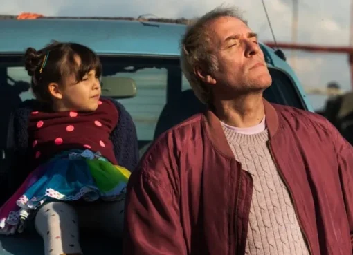 A dramatic still from the film 'Armony' featuring actors Valerio Mastandrea and Asia Argento.