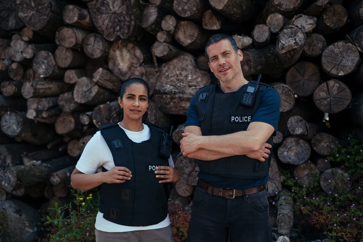 Image of a moody British crime drama with two main characters, possibly Cooper and Fry.