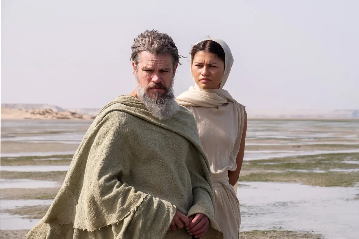 Zendaya bundled up in warm clothing on a snowy, icy film set in Iceland.