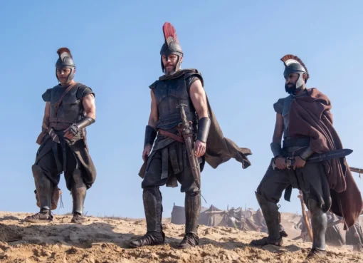 A dramatic shot from Christopher Nolan's 'The Odyssey', showing a character looking intensely.