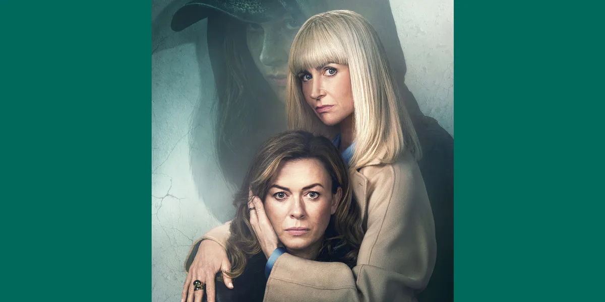Still from The Crow Girl Season 2 trailer showing lead characters Eve Myles and Katherine Kelly in a dramatic, dark setting.