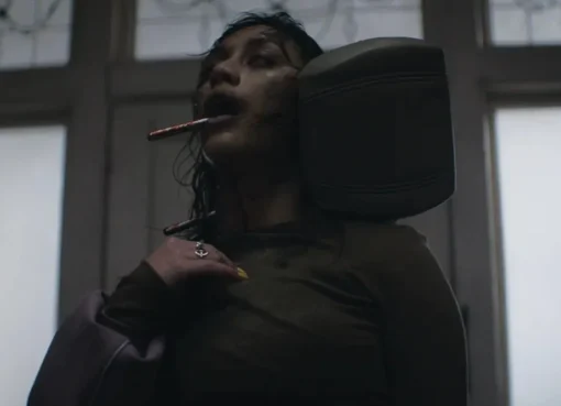 A scary scene from the movie Evil Dead Burn with blood and creepy vibes.