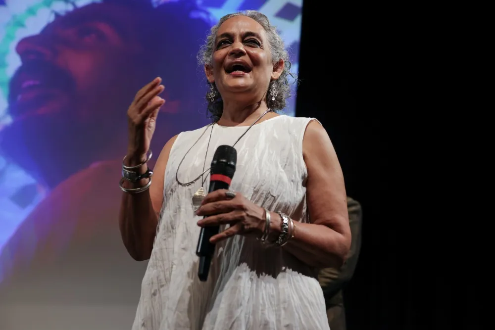 Arundhati Roy speaking on stage at BFI Southbank.