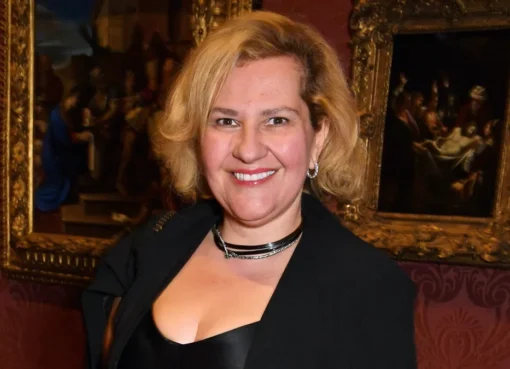 Teni Melidonian smiling during an event, possibly for the Academy.