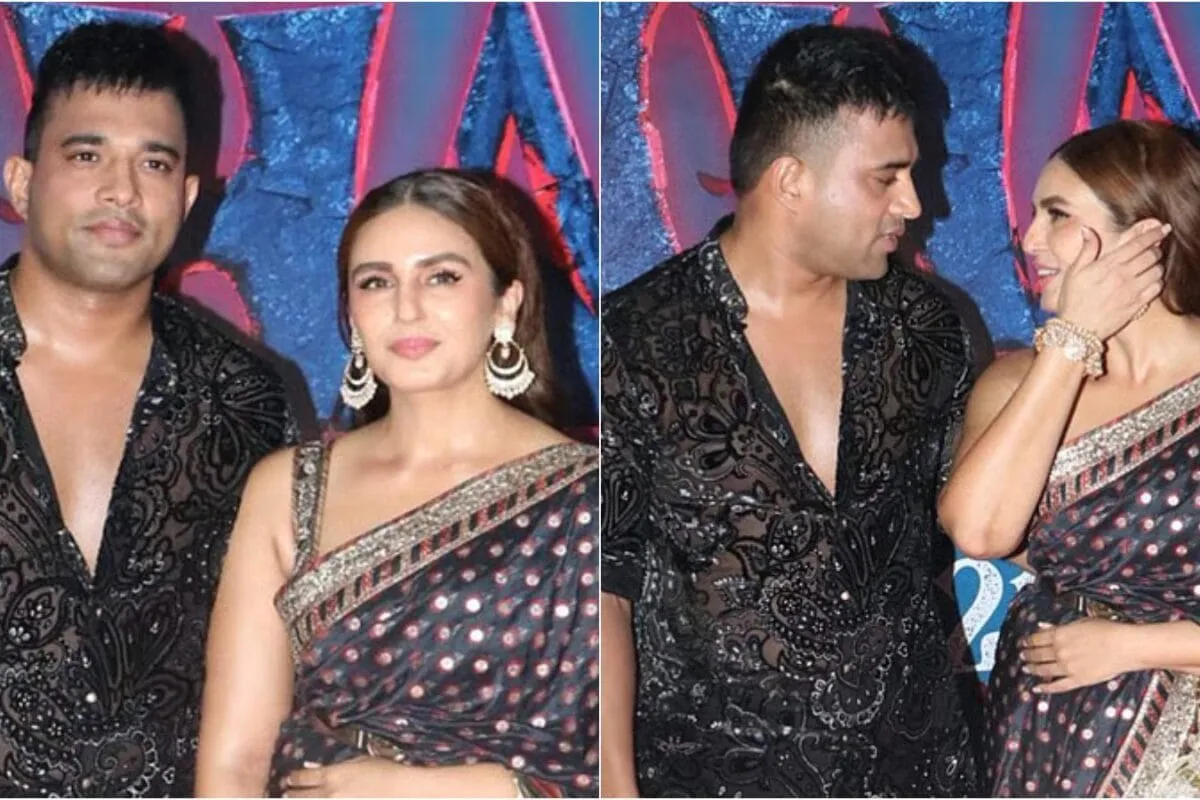 Huma Qureshi and Rachit Singh smiling in a candid shot.