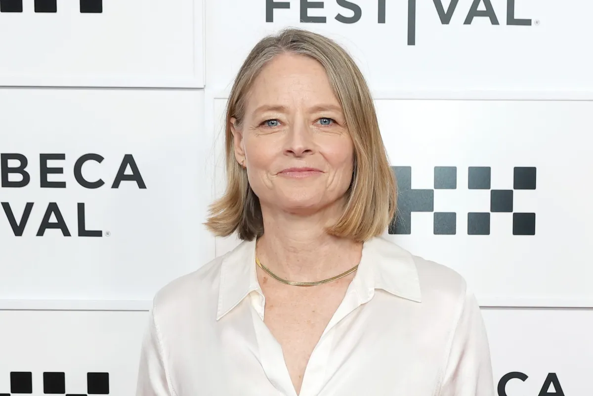 Jodie Foster speaking at the Aspen Festival, looking thoughtful and engaged as she discusses Hollywood's future.