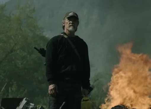 Josh Brolin looking intense in a movie scene.