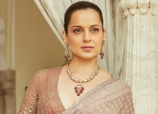Kangana Ranaut speaking passionately, with a colorful background.
