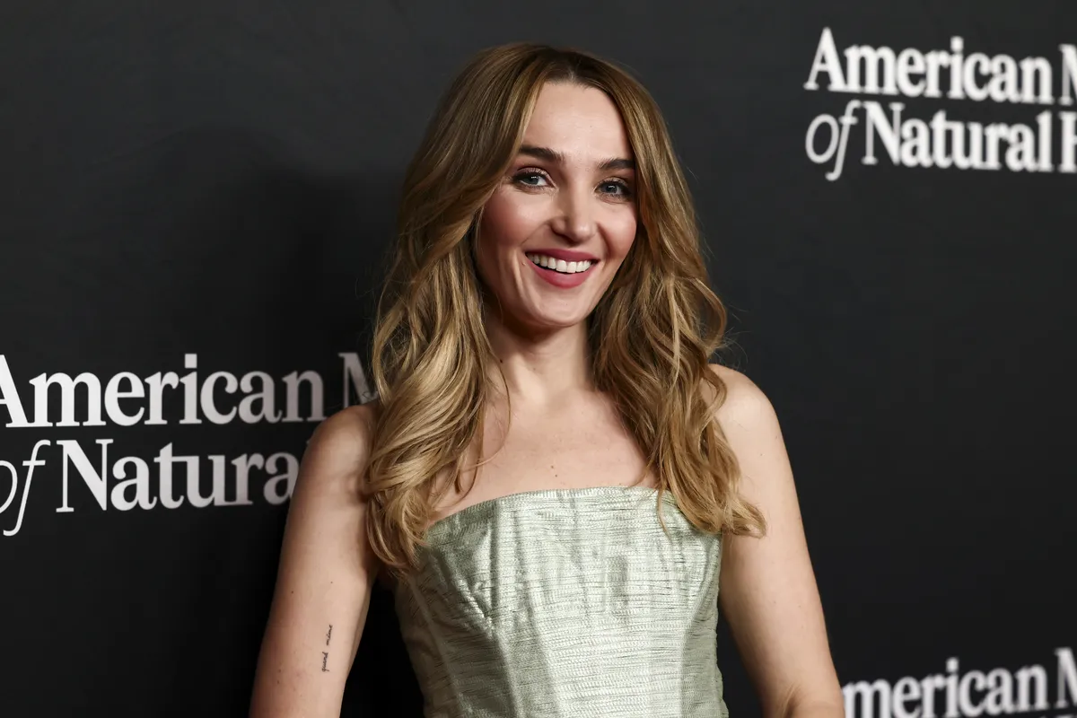 Chloe Fineman on the red carpet, recalling Lorne Michaels at a World Cup match.
