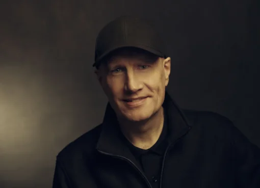 Kevin Feige smiling at an event