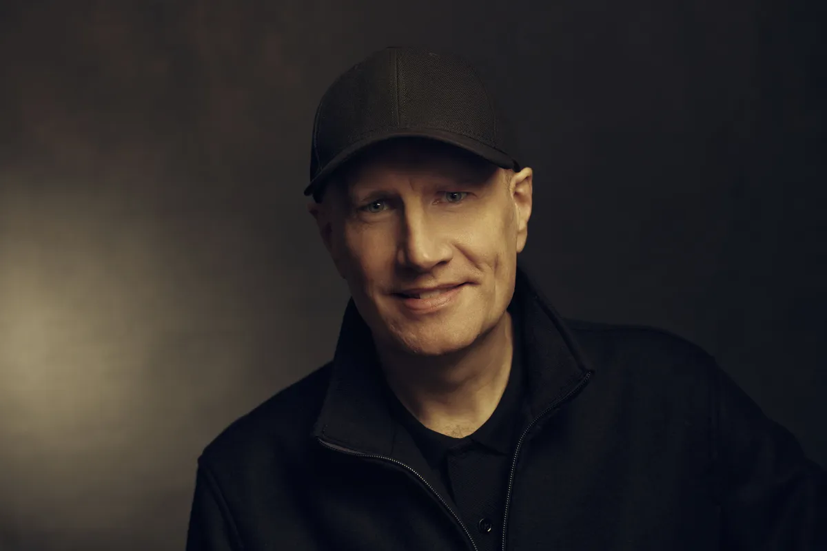 Kevin Feige smiling at an event