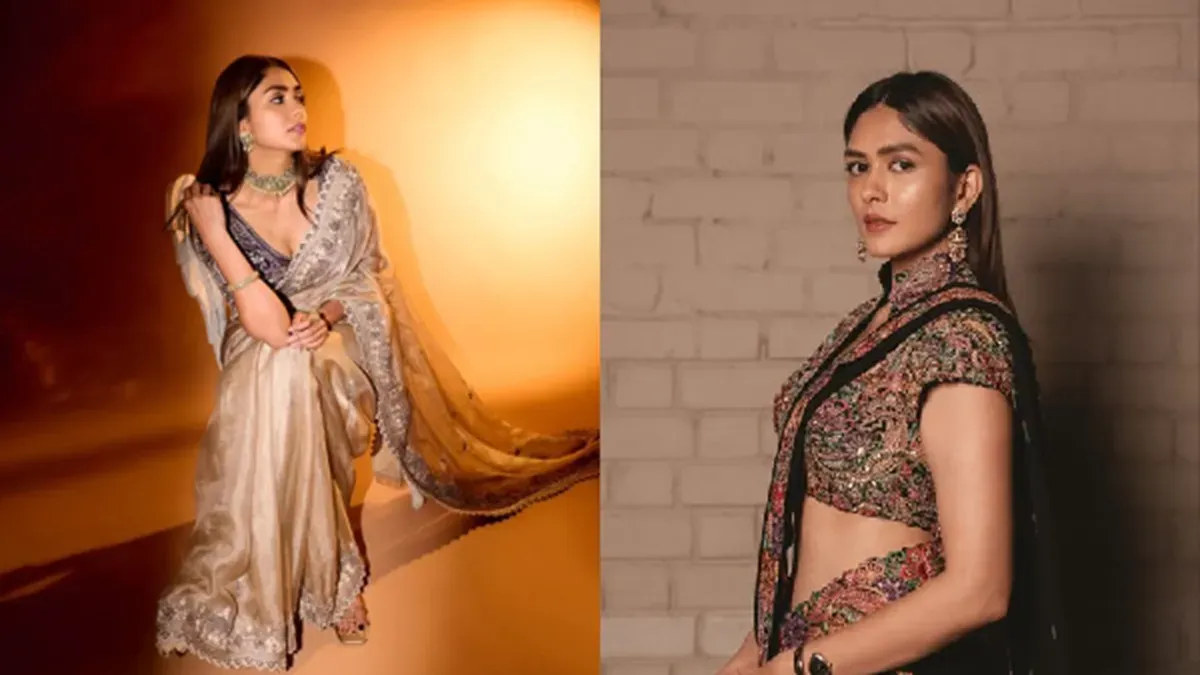 Mrunal Thakur smiling gracefully in a beautiful modern saree.