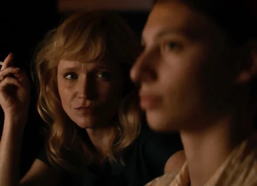Film still showing 1980s Czechoslovakian fashion and interiors, with a muted color palette.