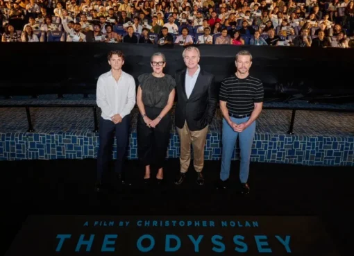 Director Christopher Nolan speaking at an event.