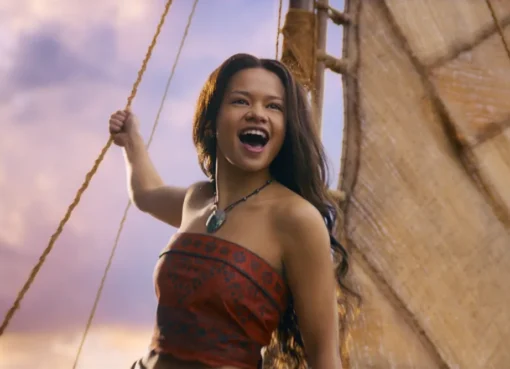 A vibrant image of Moana in a live-action setting, perhaps on a boat or by the ocean, with a determined expression.