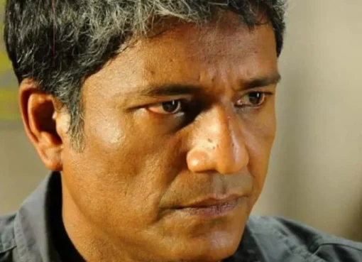 Actor Adil Hussain looking concerned.