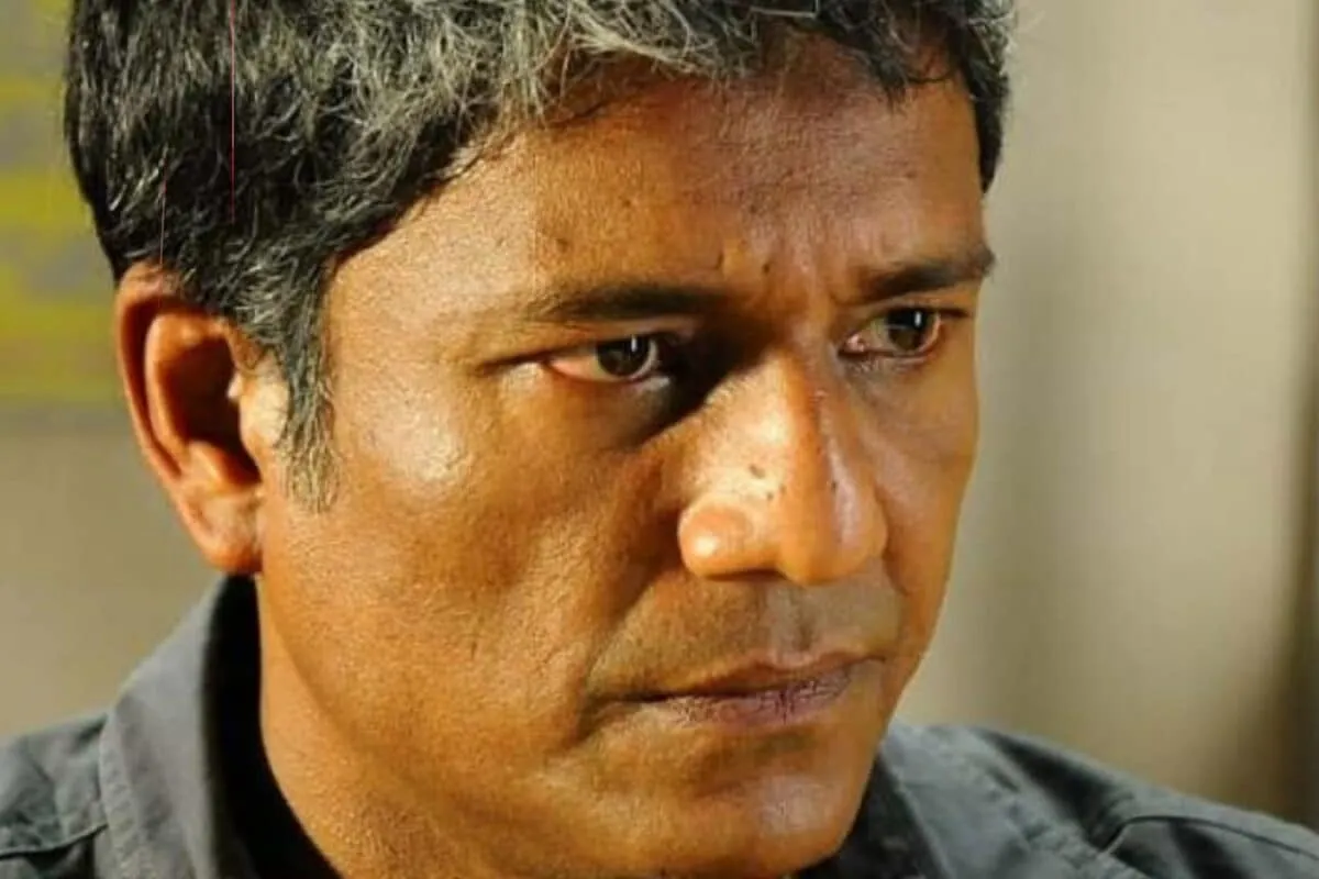 Actor Adil Hussain looking concerned.