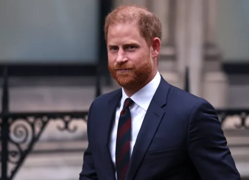 Prince Harry looking serious in a courtroom setting.
