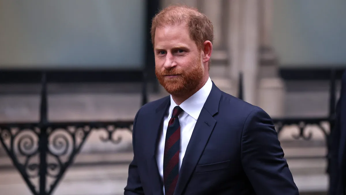 Prince Harry looking serious in a courtroom setting.