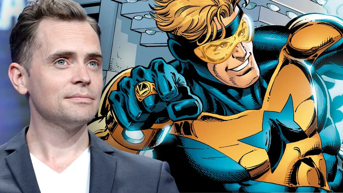 Booster Gold, a man in a gold and blue superhero suit, looking disappointed.