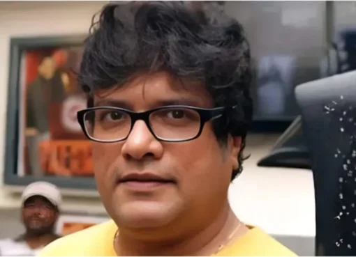 A portrait of actor Rajesh Sharma looking calm
