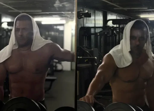 Salman Khan shirtless in a gym, flexing his muscles with an intense expression.
