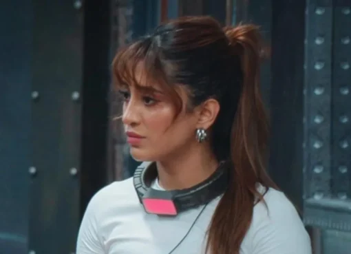 Shivangi Joshi smiling and looking confident, as if ready to face challenges.