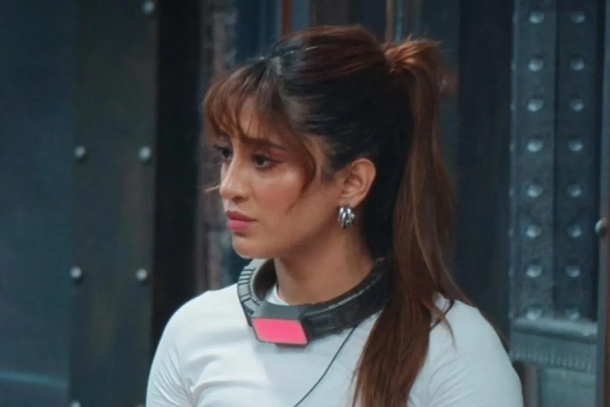 Shivangi Joshi smiling and looking confident, as if ready to face challenges.
